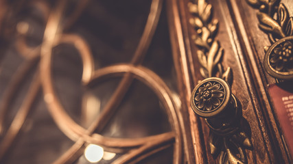 Wooden door knob handles on wood carving door.