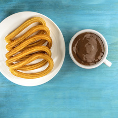 Churros with hot chocolate, traditional Spanish breakfast