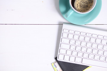 Modern workplace with cup of tea, top view