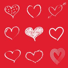Hand drawn hearts isolated on red background. Vector.