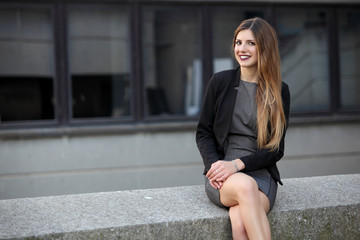 Fototapeta premium Young smiling businesswoman