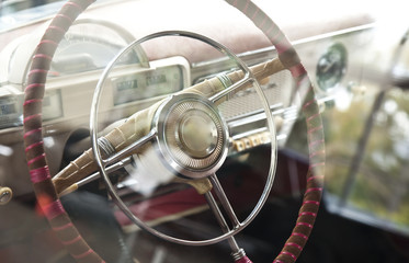 Fototapeta na wymiar Old retro car's steering wheel