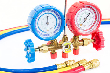 Manometers on equipment for investigate and refueling of air conditioners.