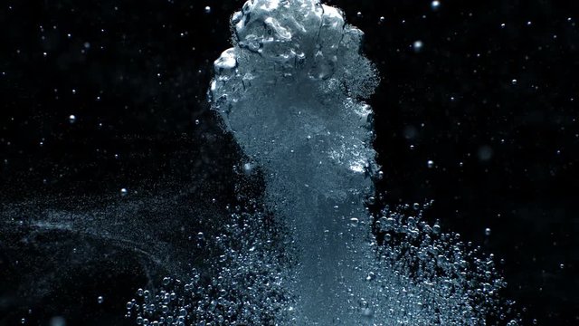 Underwater bubbles in frozen animation. Gas eruption in stopped motion under water. Separated on pure black background, contains alpha channel.