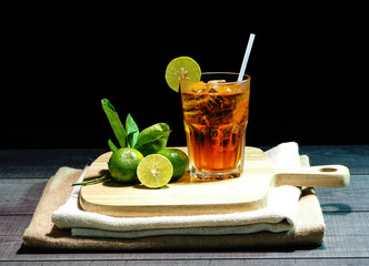 Lemon Iced Tea on Wood Table and Black Background