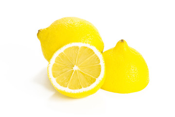 Three lemons on white background. Bright fruits. Yellow lemons
