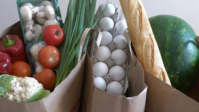 Supermarket paper bags with fresh products