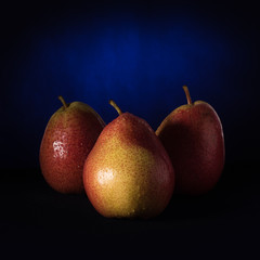 Pear red and yellow on a colored background