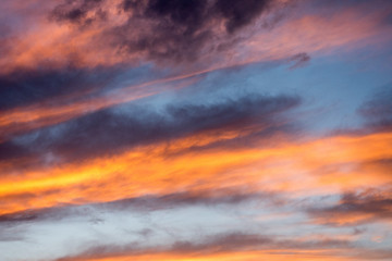 Fototapeta na wymiar Golden clouds at sunset. South of Spain, Torrevieja