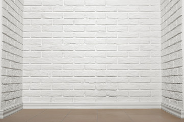 white brick wall with tiled floor, abstract background photo