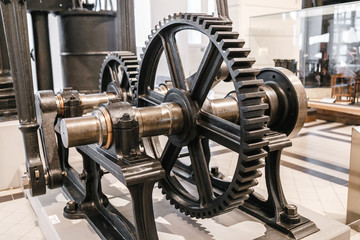 large cogwheel gear in metal machine work shop