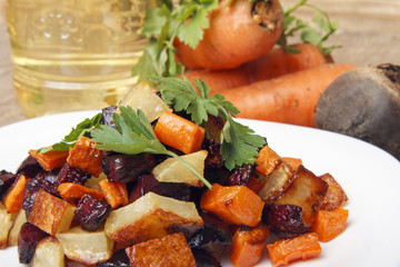 Salad baked beetroot, fresh carrots and potatoes. Healthy food from organic products