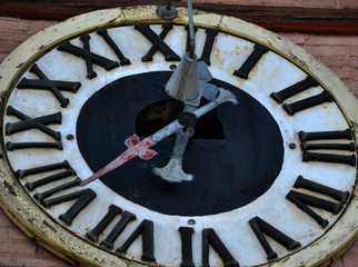 Dial an old clock, located at the town hall
