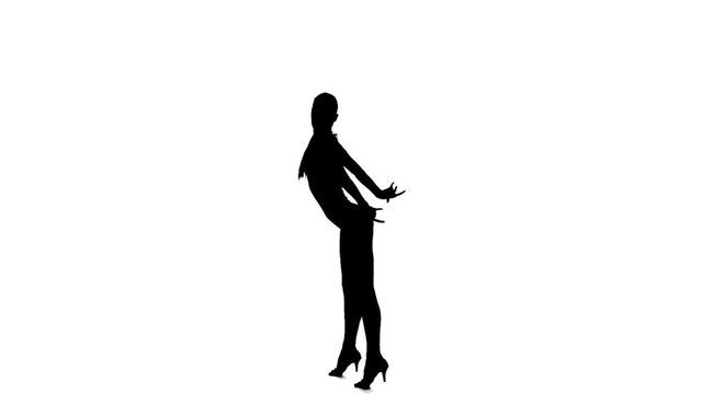 Professional dancer woman dancing samba, slow motion. White background, silhouette