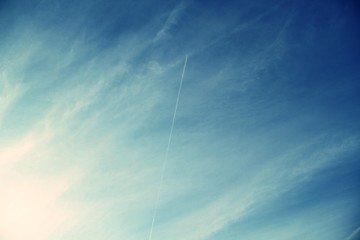 Sky with clouds and trails