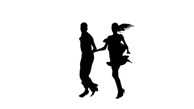 Silhouette professional pair dancing jive on white background. Slow motion