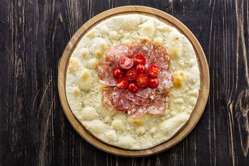 Focaccia with salami Milano and cherry tomatoes