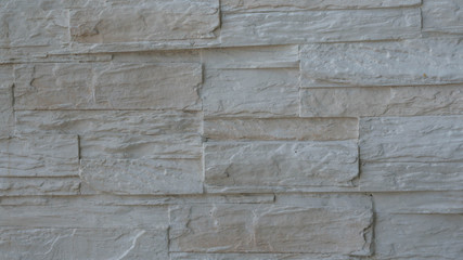 The gray modern stone wall