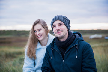 Portrait of young smiling couple outdoor