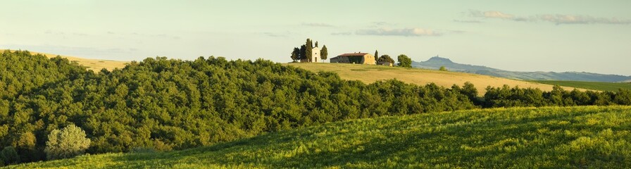 Fototapeta na wymiar panorama with tuscany chapel in sunset time