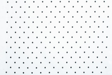 White dotted fabric pattern as background or texture
