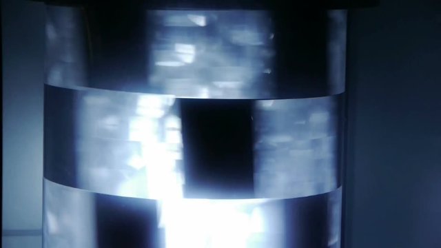 Rotating neon light.