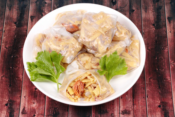 Steamed Dumpling stuffed soft bamboo pole shoots.