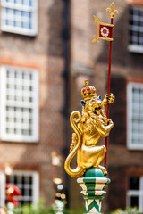 Golden lion in inner court of Hampton Court, London