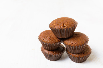 Stack of five cocoa muffins