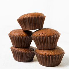 Stack of five cocoa muffins