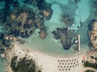 Aerial view of the Sardinian Emerald Coast, with its turquoise sea. in Sardinia Island, is one of the most beautiful and famous coasts in the world