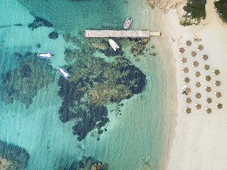 Aerial view of the Sardinian Emerald Coast, with its turquoise sea. in Sardinia Island, is one of...