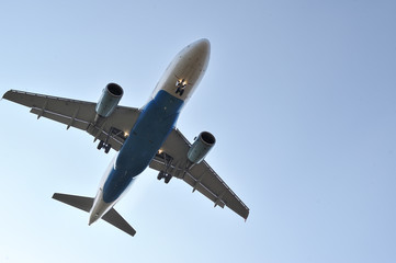 Airplane on blue sky