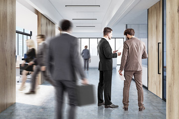 People in wooden open office and reception
