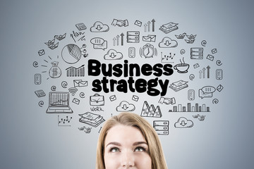 Blond woman s head and business strategy