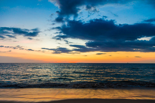 Sunset over sea beach wave scene © themorningglory