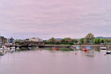 Fototapeta na wymiar Small boats and sailboats in Dungarvan Harbor, County Waterford, Ireland. 