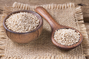 Grains of quinoa on wood - Chenopodium quinoa