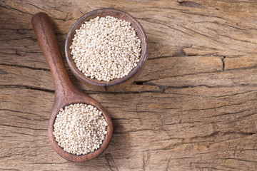 Grains of quinoa on wood - Chenopodium quinoa