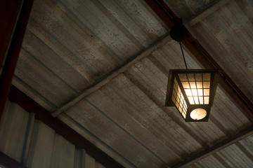Obraz premium Lighting lamp under the ceiling