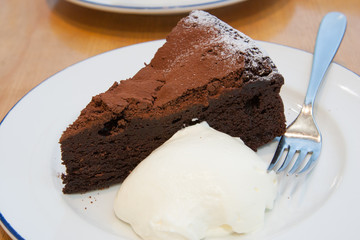 Chocolate cheese cake served with Whip Cream and Icing on top
