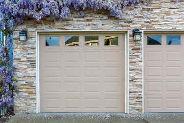 Wisteria Flowers by Home Garage Doors
