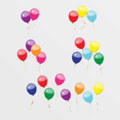 group of colorful balloons set with golden ribbon on white background vector design