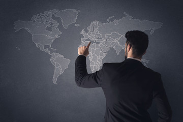 Businessman with world map