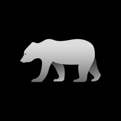 Silhouette of a gray bear standing. Bear side view profile.