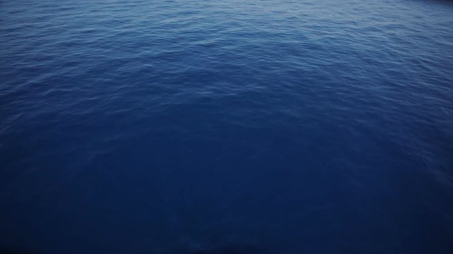 View of ocean waves from the bow of a container ship