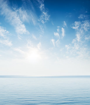 Fototapeta blue sea and sky in sunset