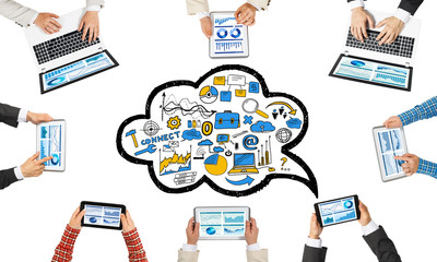 Top view of businesspeople sitting at table and using gadgets