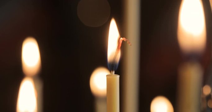 Detailed Shot of Burning Candles in the Church