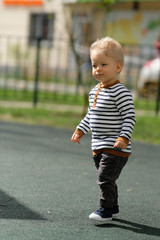 One year old baby boy toddler at playground